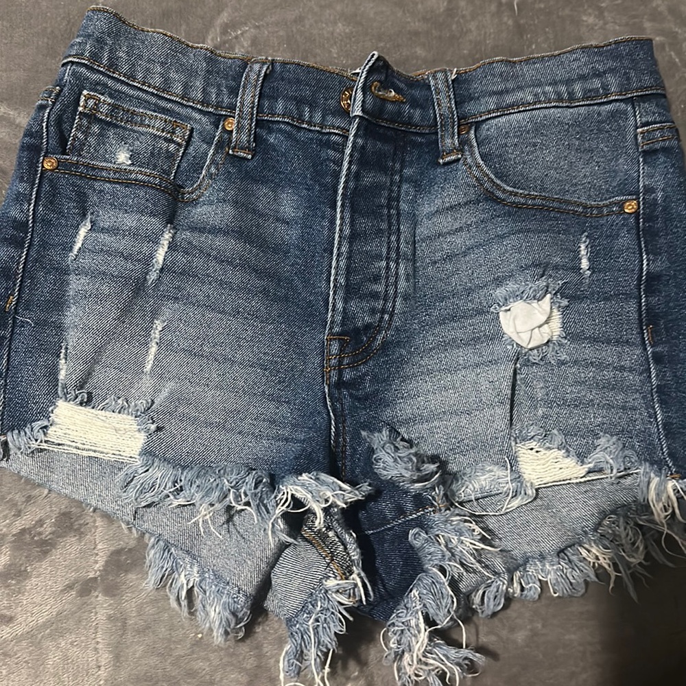 dark blue distressed jean shorts